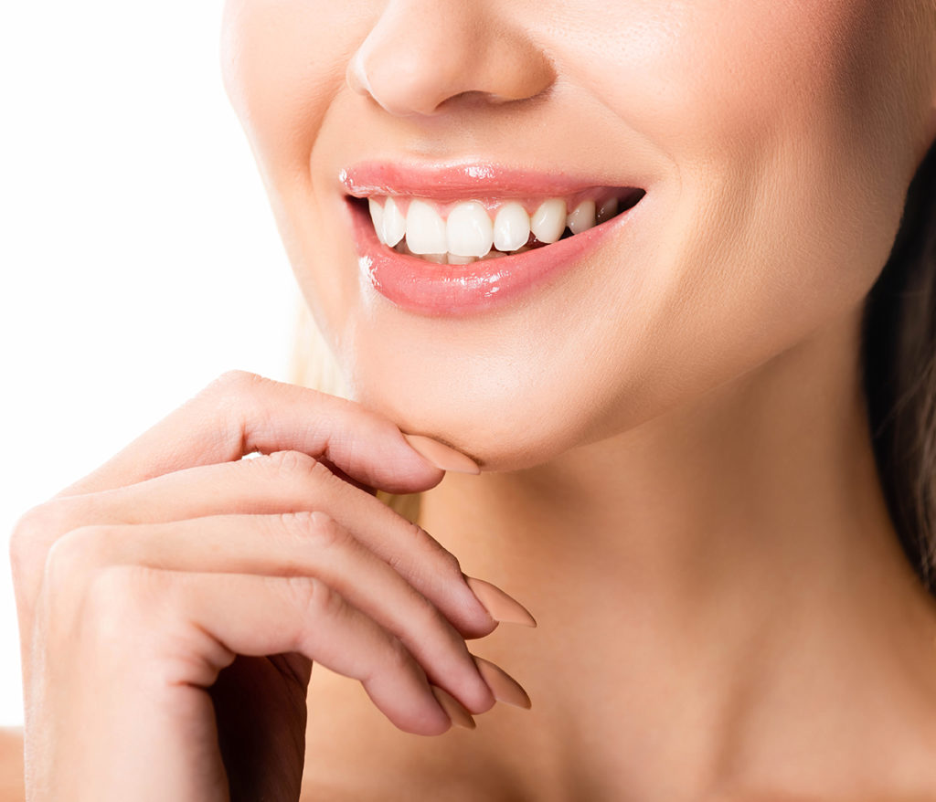 Use veneers to close gaps between teeth with Scottsdale cosmetic
